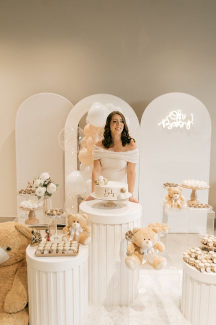 Elegant baby shower party setup with balloons and cake